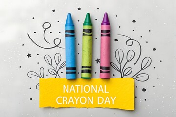 Three brightly colored wax crayons arranged vertically above a vibrant yellow banner celebrating the occasion of national crayon day with whimsical doodle art background elements.