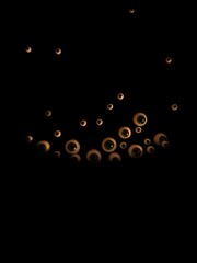 A constellation of tiny spectral eyes peeking from a velvet black background, offering a playful, enigmatic gaze,  constellation,  minimalist