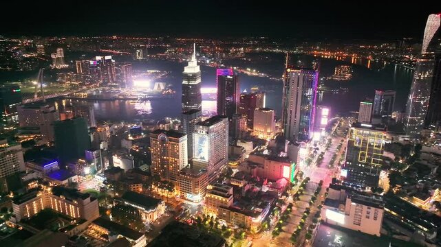 Aerial view of Nguyen Hue Walking Street and City Hall or Sai Gon City Hall, Ho Chi Minh city, Vietnam. Beautiful night view. Travel concept.