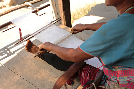 Weaves cotton from old karen woman. It is a souvenir product sold to tourists. at Ban Mae Wang. Chiang mai, Thailand
