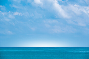 Nature clear sky and summer sea water for summer vacation concept.with sunlight of beautiful clouds blue sky with white altocumulus clouds.with	