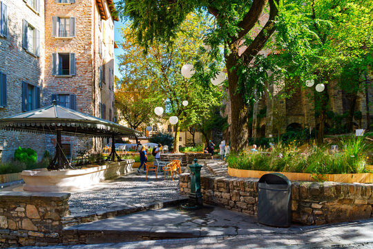 The picturesque PIazza della Cittadella with the Antico Lavatoio public wash station, in the medieval center of Citt&agrave; Alta, the upper hilltop historic old town of Bergamo, Italy.