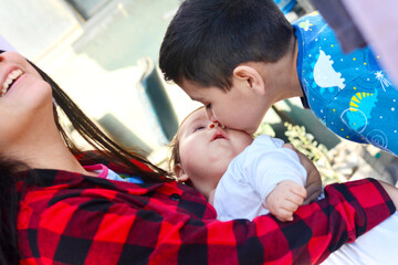 Three latin siblings with big age difference.