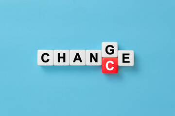 Dice with flip block CHANGE to CHANCE word on blue background. success, strategy, solution, business and Positive thinking concepts