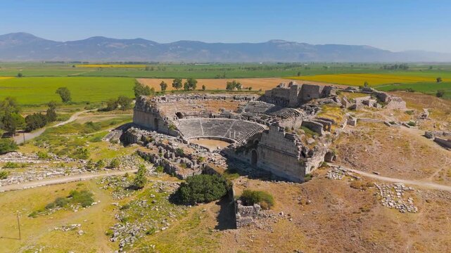Balat, Turkey. Aerial drone view of the ancient Theatre of Miletus, main landmark of the archaeological site with rows of seats and stage. Aerial View, Point of interest