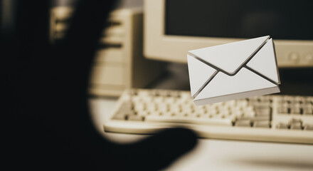 Cyber Phishing and Hacking Concept: Shadowy hand reaching for 3D email envelope over retro vintage computer, symbolizing data theft, unauthorized access, and digital security breach.