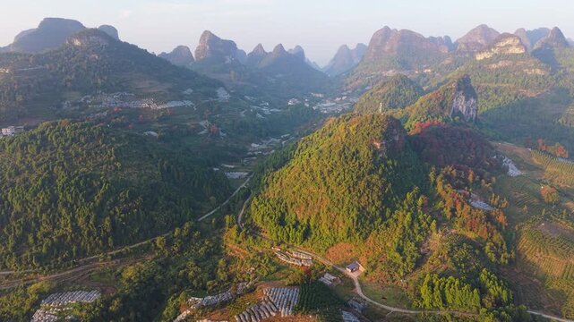 Sunrise aerial view of karst landscape near Xianggong Mountain, Yangshuo, Guilin, China