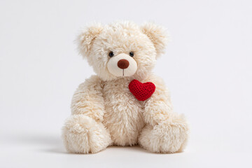 Obraz premium Adorable teddy bear with a red heart, perfect for Valentine's Day, expressing love and affection for romantic designs