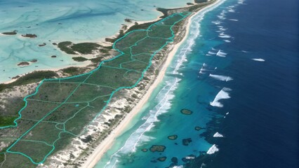 Aerial view of a coastal landscape featuring sandy shores, turquoise waters, and lush vegetation, illustrating a serene and untouched natural environment.