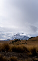 popocatepetl volcano with snow in cloudy sky