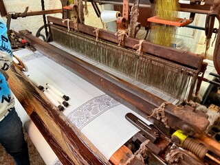 Traditional Himroo textile weaving workshop with vintage looms in Aurangabad Maharashtra India
