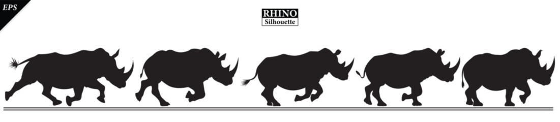 set of Black silhouette of rhinoceros isolated on white background, Beautiful rhinoceros logo icon vector design, standing, rhino silhouette vector illustration, vector. Black rhino Silhouette logo  © Usman Tahir Isolated