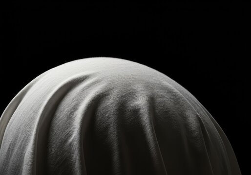 Close-up view of the distinctive white head covering associated with high religious office, emphasizing texture, purity, and bright illumination ,textile ,illumination ,faith
