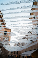 White Streamers Over Stone Street in Mediterranean Village