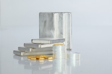 Stacked 1kg Silver bars coins & gold ingots