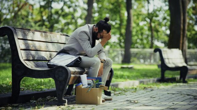 Sad Fired Man Feeling Stressed   Sitting On Park.  Disappointment Of Fired Specialist  