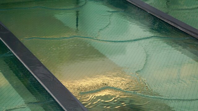 Glass skylight water feature in downtown Tokyo