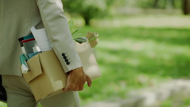 Worker Leaving Office After Job Loss