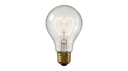 Vintage incandescent light bulb with a glowing heart-shaped filament emits a warm, bright light, representing concepts of love, passion, and brilliant ideas