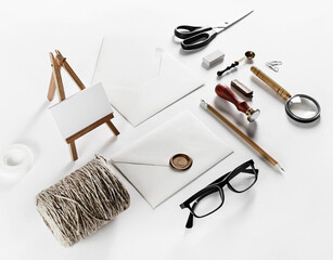 Vintage postal accessories on paper surface. Mock up for your design.