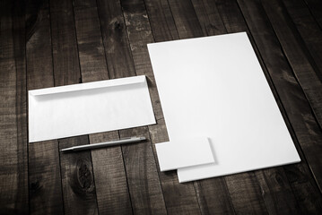 Branding stationery mockup . Corporate identity mock up. Blank letterhead, business cards, envelope and pen on wooden surface.