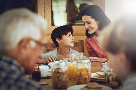 Smile, mother and child with cereal for breakfast, healthy nutrition and bonding together. Happy, woman and child in dining room for meal preparation, parental support and family connection at house