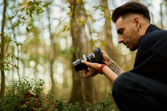 Photographer captures nature in the woods during a sunny day