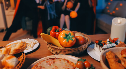 Friends enjoying a Halloween party at a bar making a toast