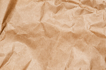 Textured Brown Cardboard Paper With Close-up View Creases and Folds Creates an Organic Visual Effect, Ideal for Backgrounds in Art and Design Projects. This Natural Material Enhances Creativity.