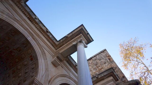 Hadrian Gate, also known as the Uc Kapilar, at the entrance to Antalya Old Town or Kaleici on a sunny day