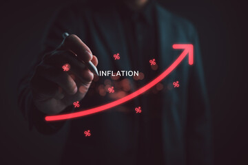 Businessman drawing red rising arrow with inflation text and percentage icons. Conceptual of high interest rates, economic crisis, financial risk, cost of living, and price increase.