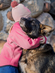 Tender Child And Dog Embracing Moment