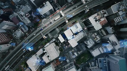 Aerial view of modern city and roads taken by drone and digital technology concept - Powered by Adobe