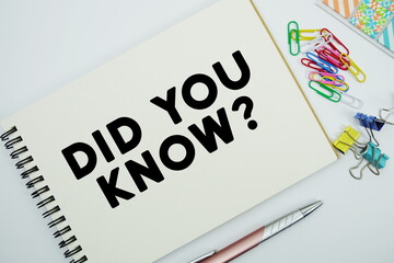 Did You Know? text message written on notepad with stationery flat lay on white background