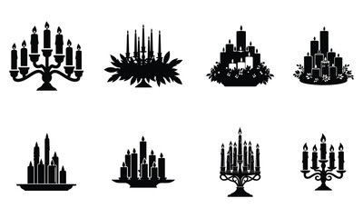 Fototapeta premium Collection of black candle silhouettes in various holders and candelabras for elegant home decor and lighting