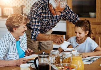Happy, grandparents or kid in house with breakfast, bonding together or connection in healthy...