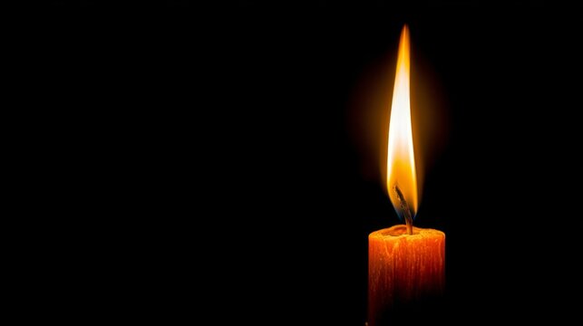 Flickering Candle Flame in Darkness Capturing the Warm Glow of Light and Shadow in a Serene and Peaceful Atmosphere for Relaxation and Reflection