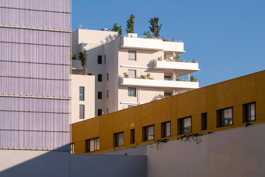 Colorful modern architecture apartment facade geometric urban skyline Montpellier Port Marianne France contemporary buildings under clear blue sky