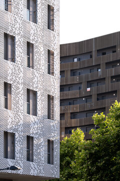 Modern architecture apartment facade pattern windows urban residential Montpellier Port Marianne France contemporary highrise exterior under blue sky