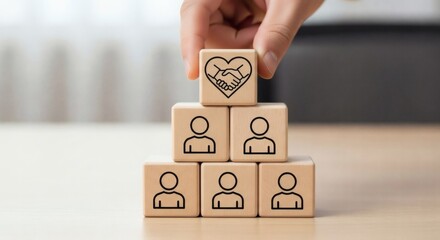 Business partnership concept. Trust icon wooden block placed on top of structured people blocks, representing leadership trust hierarchy and organizational unity.
