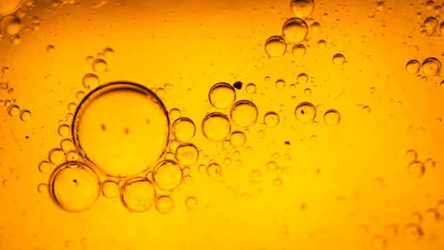 Yellow bubbles background, cooking oil emulsion, frying.