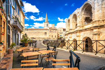 Arles, France. Town of Arles  Amphitheatre and colorful street architecture view