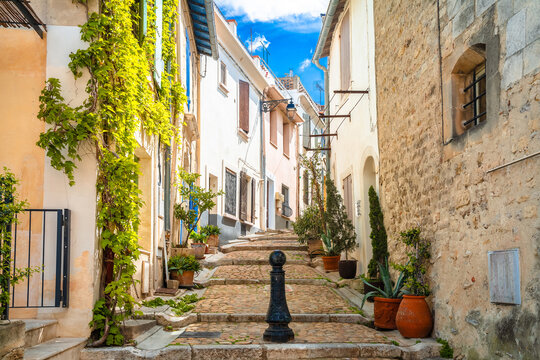 Arles, France. Antique cobbled street in old town of Arles view