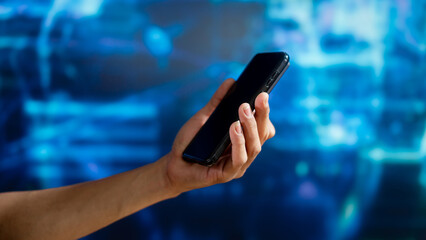 Close up of hand holding smartphone against futuristic digital background, representing mobile technology, data driven business strategy, fintech services, cloud solutions, cybersecurity systems