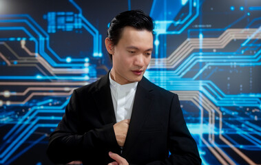 Fototapeta premium Stylish businessman adjusting his formal suit in front of glowing digital circuit background, representing confidence, modern leadership, advanced technology, strategic thinking, professional success