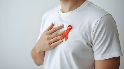 Elderly with Red Ribbon for December World Aids Day, MADD, October Red ribbon week, February Heart month, Marfan Syndrome, May Stroke awareness, March world TB Tuberculosis day and April Dare day