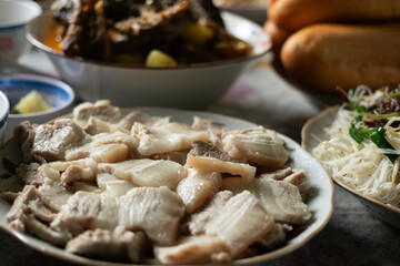 Close-up of sliced boiled pork belly, a simple yet essential traditional dish in Vietnamese daily and festive family meals
