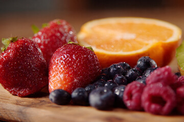 Healthy smoothie ingredients fresh fruits cutting board preparation 
