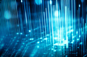 Abstract digital background featuring vertical lines and glowing particles in shades of blue, creating a futuristic atmosphere with a sense of depth and movement