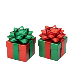 Obraz premium Two festive gift boxes with vibrant green and red ribbon bows stand against a dark isolated backdrop creating a holiday